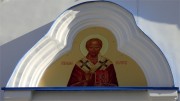 Образ Иоанна Златоуста на фасаде Знаменского собора в Тюмени.